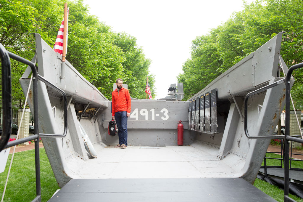 Image: Visitors climb aboard a restored Higgins Boat outside the National Inventors Hall of Fame and Museum at the USPTO headquarters in Alexandria, Virginia.