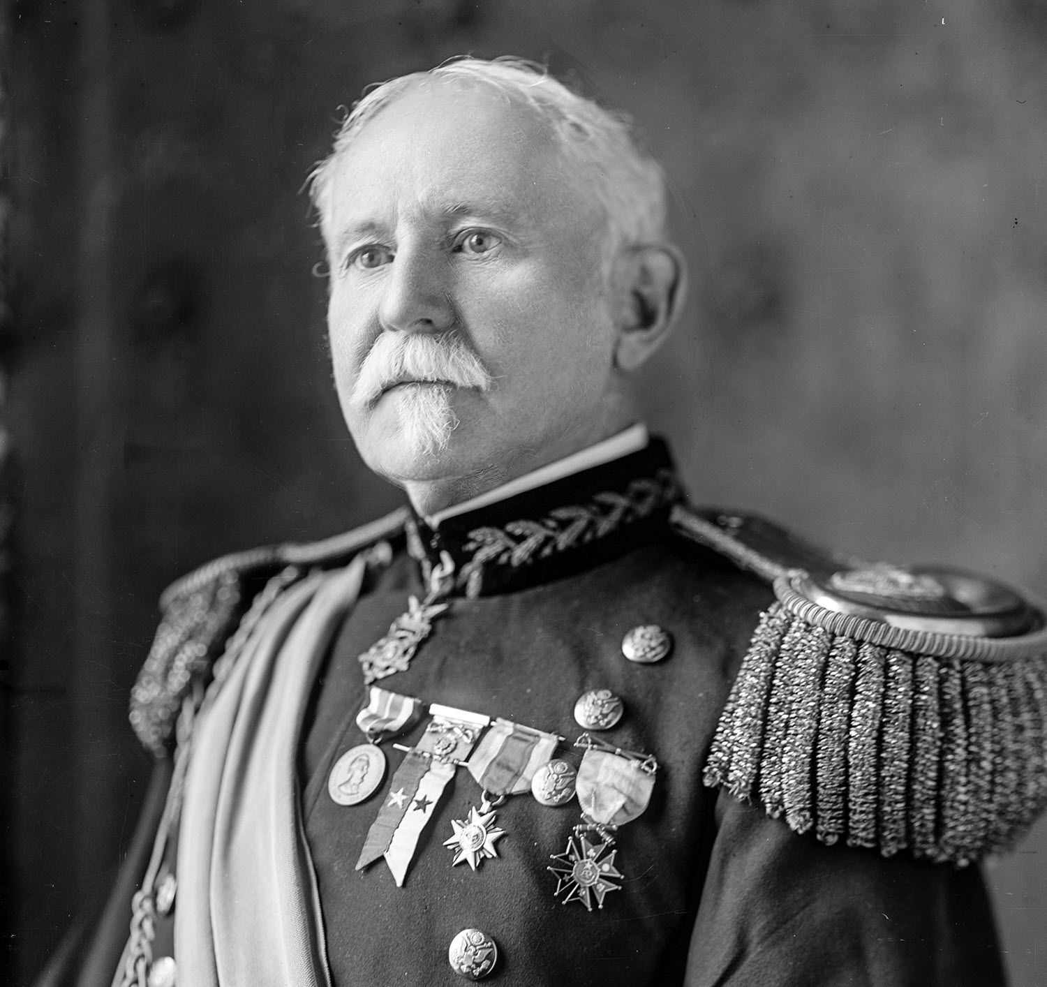 An older man, George Gillespie, in full military uniform with several medals, including the Medal of Honor pinned to his lapel.