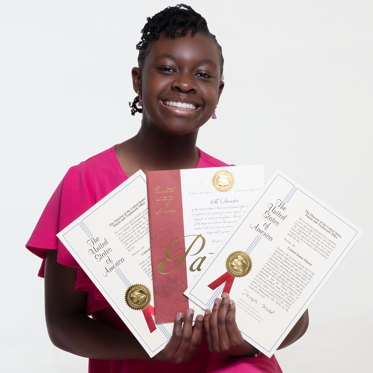 Gabby Goodwin holding three patents