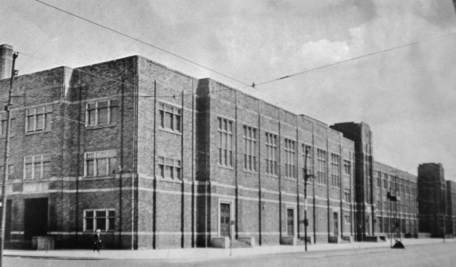 Black and White photograph of the exterior of DuSable High School, located in Chicago. 