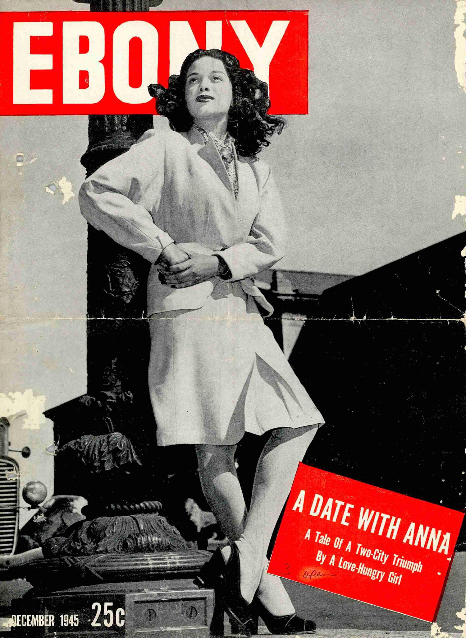  Copy of the cover of Ebony magazine featuring a woman wearing a light colored dress leaning against an architectural column.