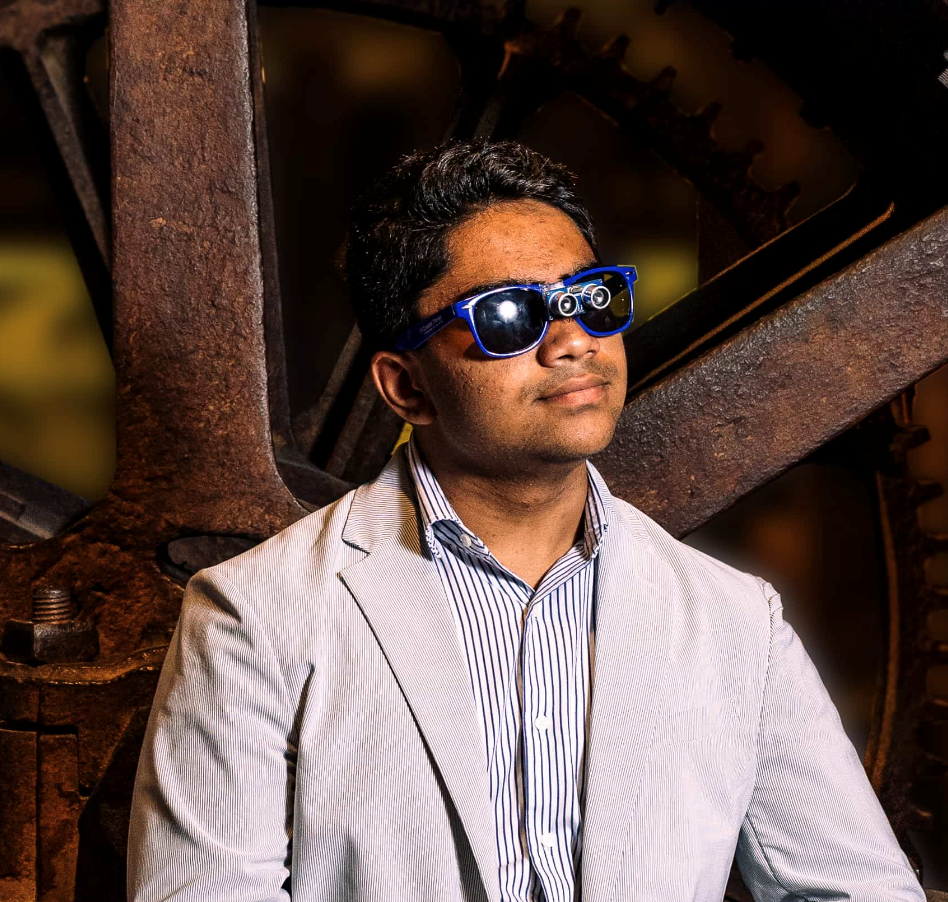 Sidharth Anantha demonstrating his Seeing for the Blind invention, a device to help blind people navigate their surroundings. 