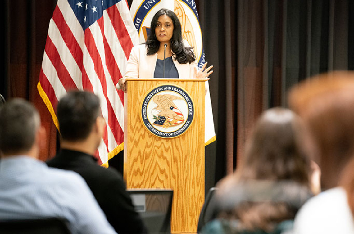 Commissioner for Patents Vaishali Udupa standing at podium speaking to an audience