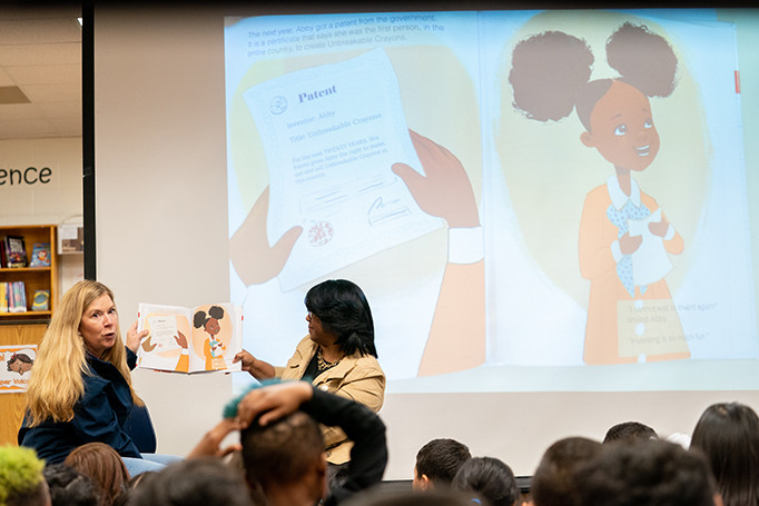 Director Vidal and Deputy Chief of Staff of the U.S. Department of Education Donna Harris-Aikens read a book to students at Cora Kelly Elementary School