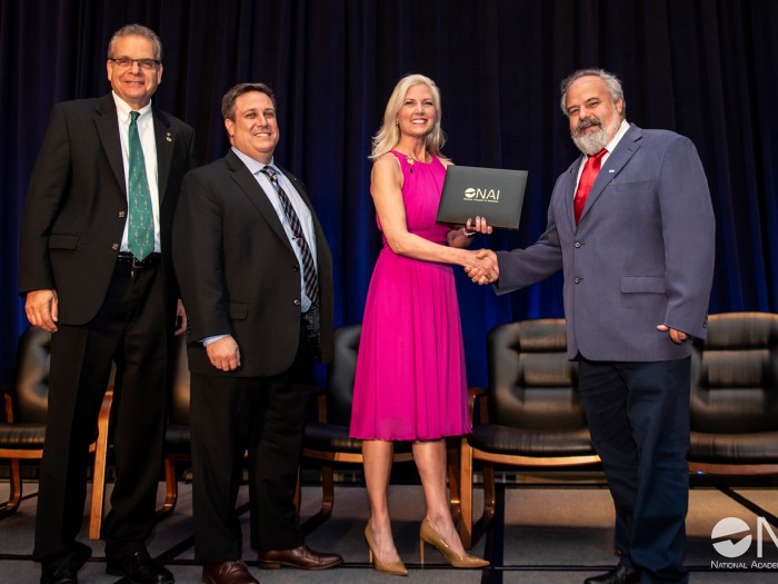 NAI President and USPTO officials presenting NAI Senior Member award