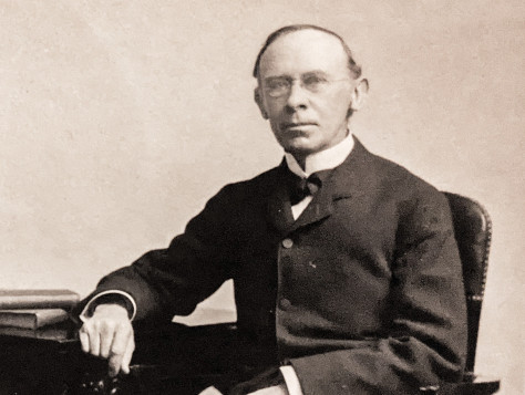 In typical Victorian dress, Samuel Allen poses for a formal portrait photograph.