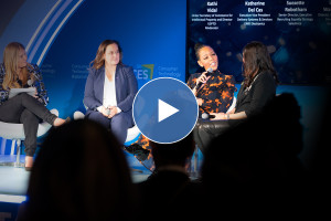 Four woman seated on a stage, one of them holding a microphone. A blue background reads Consumer Technology Association.