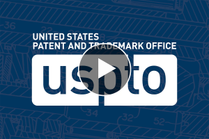 Play button superimposed over USPTO logo