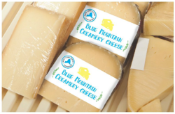 Packages of Blue Mountain Creamery Cheese with the Ney Your State Certified stamp 