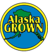 Certified Alaska grown logo with shape of state in green on blue background with circle outline and text in yellow 