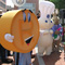 Photo of Expo costume characters standing in a row. Characters include T.Markey, Pillsbury Doughboy, Peter the Rabbit, Beetle Bailey, Betty Boop, Red and Green Crayola Crayons.