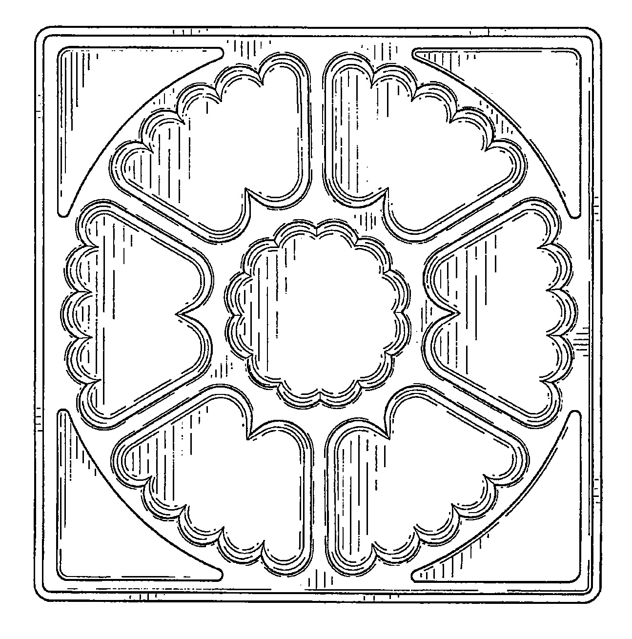 Example of a design for a compartmented tray with a rectangularperimeter that is symmetrical. 
